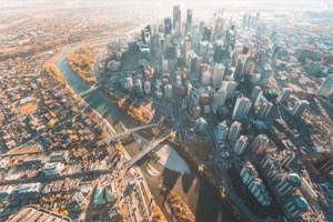 Aerial shot of calgary showing the river wrapping around the city centre